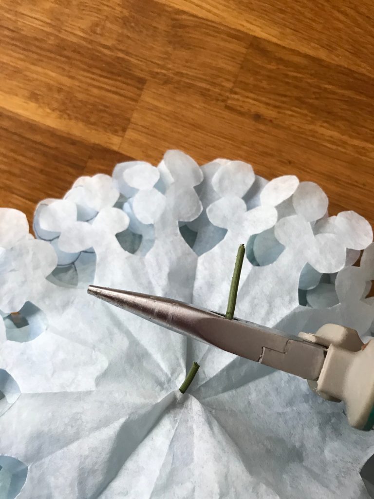 coffee filters turned into hydrangea flowers on wire. 
