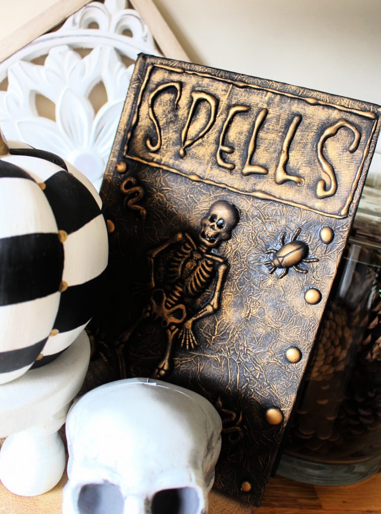 Spooky Halloween display with Halloween spell book
